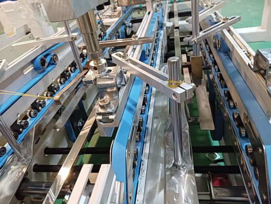 Ενισχυμένος τύπος PLC ελεγχόμενο αυτόματο φώτιο κλειδαριού κάτω από το φώτιο για κουτιά από χαρτόνι